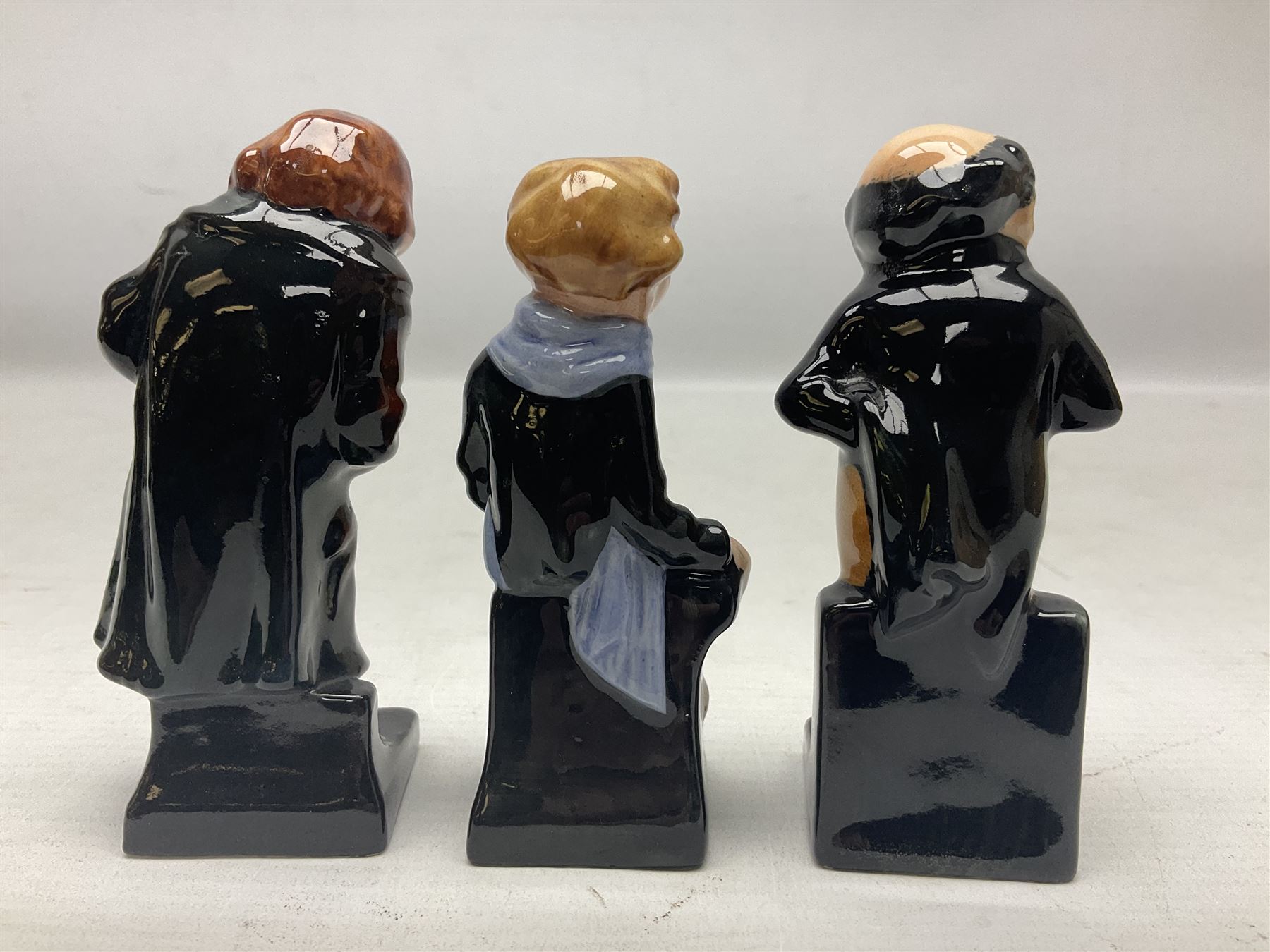 Sixteen Royal Doulton Charles Dickens figures, to include Oliver Twist, Fat Boy, Fagan, Stiggins etc, all with printed marks beneath