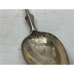 Silver spoon with elongated stem and engraved detail, indistinctly marked, probably French, L17.5cm, together with a pair of white metal apostle spoons with fig shaped bowls, L18.5cm