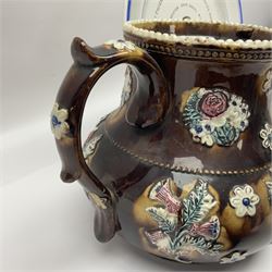 Victorian ceramic Barge Ware teapot, decorate di relief with flowers and thistles, inscribed Miss M E Whittaker Manchester 1878, together with a Victorian plate commemorating the passing of the Manchester Ship Canal Bill 1885, plate D26.5cm