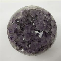Pair of amethyst geode spheres, with purple crystalline internal formations, D9cm