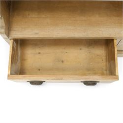Late Victorian stripped pitch pine open bookcase, fitted with four adjustable open shelves, two drawers fitted to base with pull handles, on skirted base 