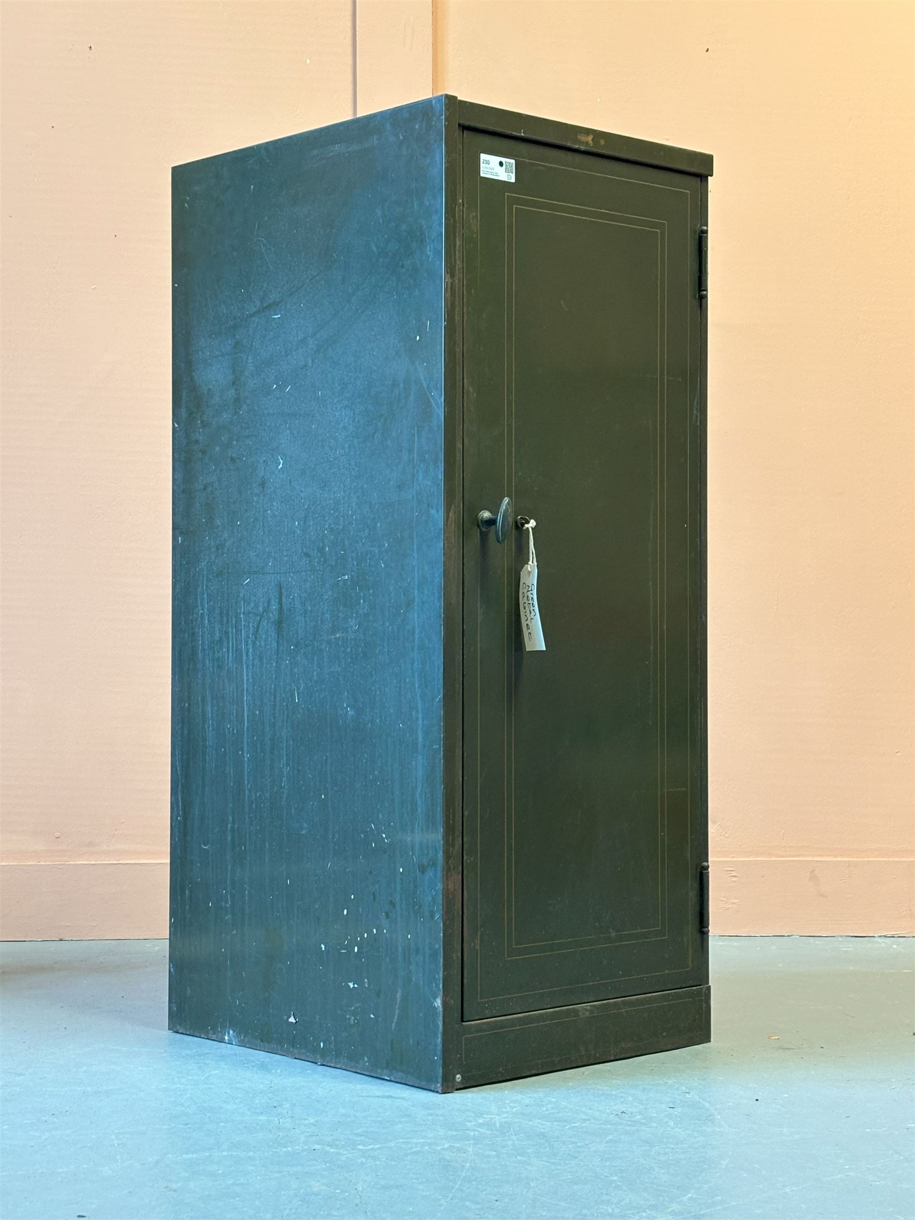 Green and gilt painted steel office cabinet, mid 20th century, the door opening to two adjustable shelves, complete with brass handle and key. H132cm, W54cm, D63cm. - COLLECTION BY APPOINTMENT FROM: The White House, Thirsk Road, Easingwold, York, YO61 3NF - CALL 01723 507111 TO ARRANGE