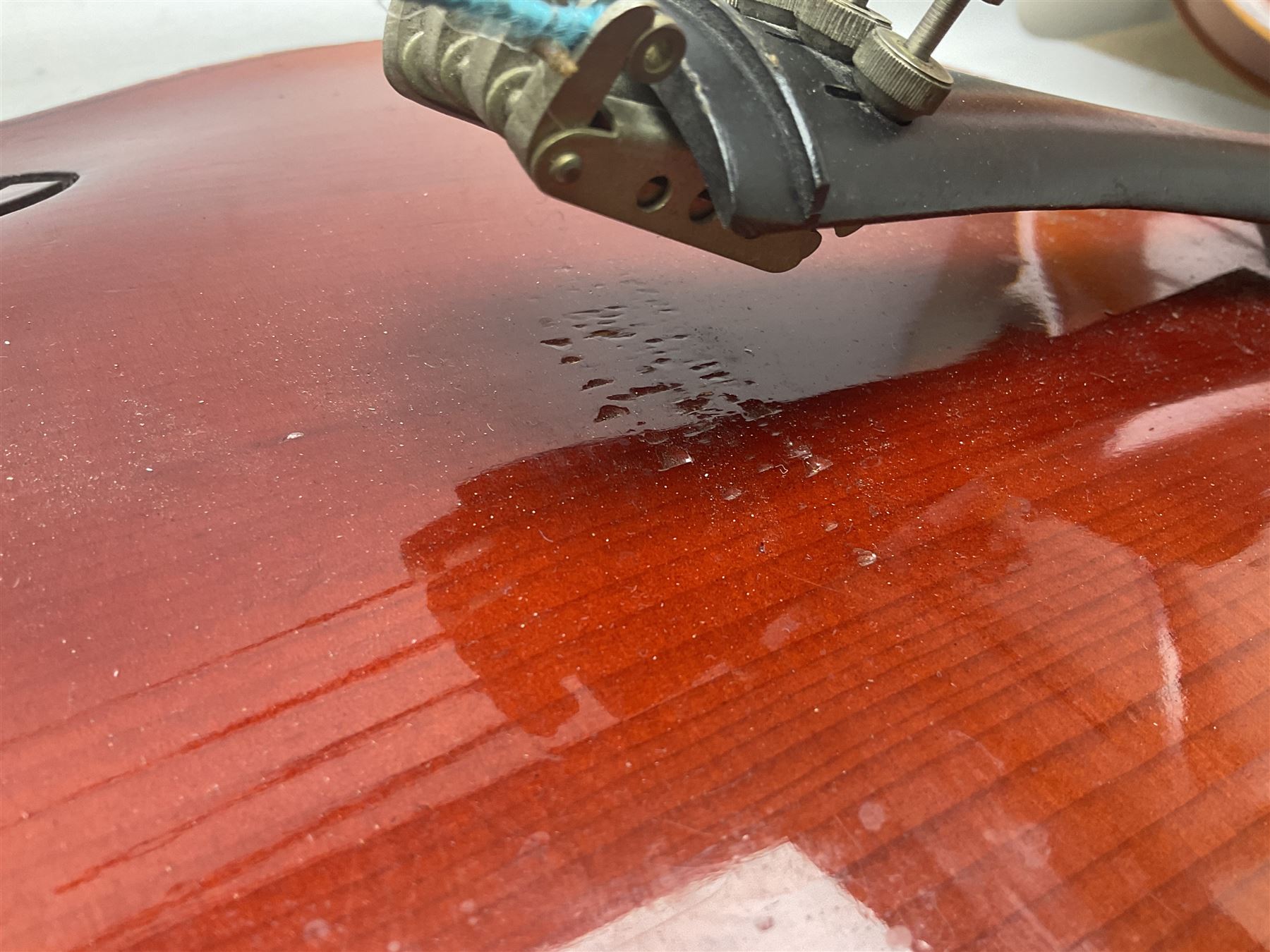 Two student half-size cellos - Boosey & Hawkes Artia with 65cm one-piece back and spruce top; bears maker's label; L104cm overall; and Romanian with 65.5cm two-piece maple back and ribs and spruce top; bears label; L108.5cm overall; each in soft carrying case with two bows (2)