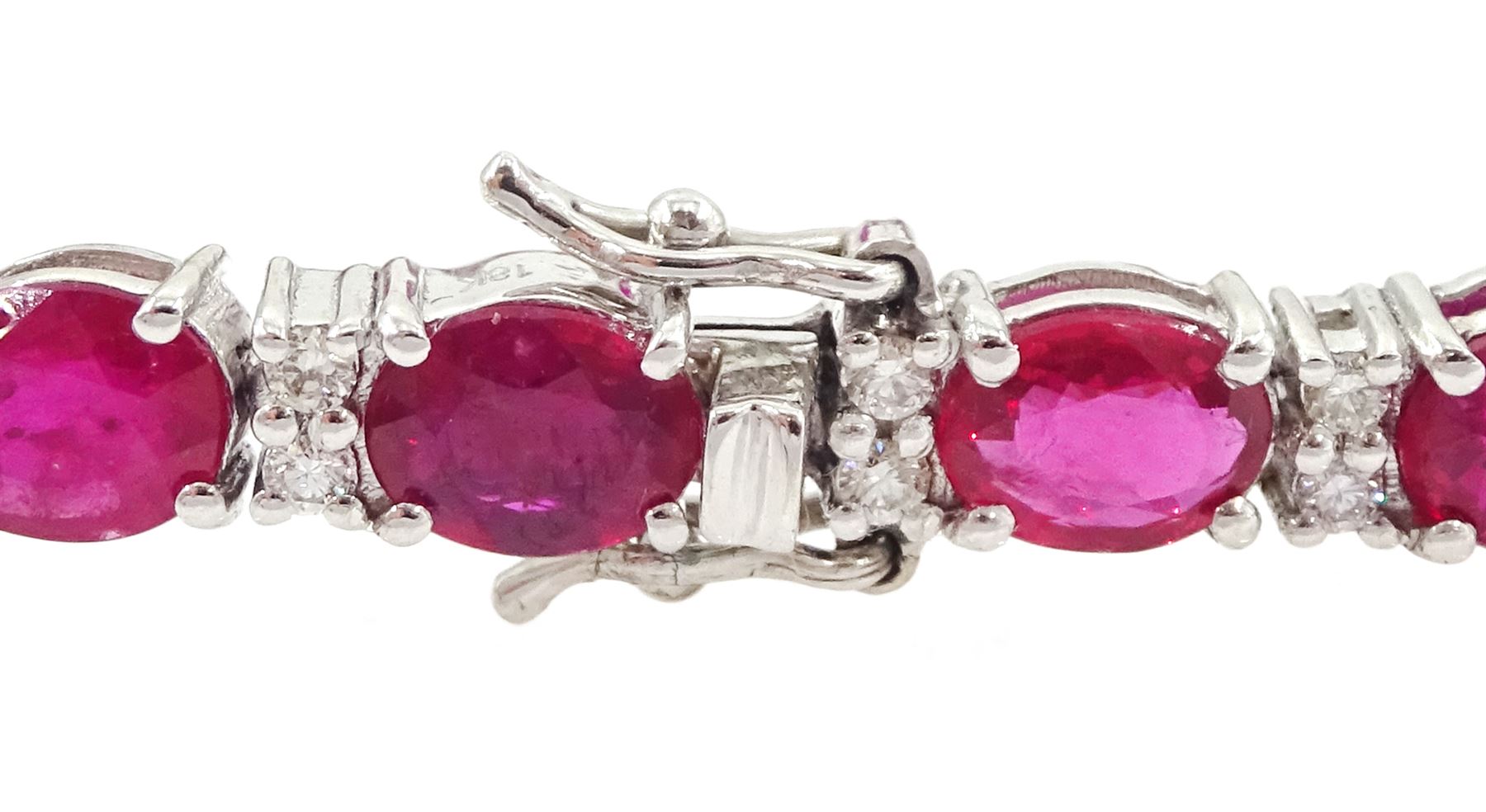 18ct white gold oval cut ruby and round brilliant cut diamond bracelet, total ruby weight approx 9.80 carat, total diamond weight approx 0.50 carat