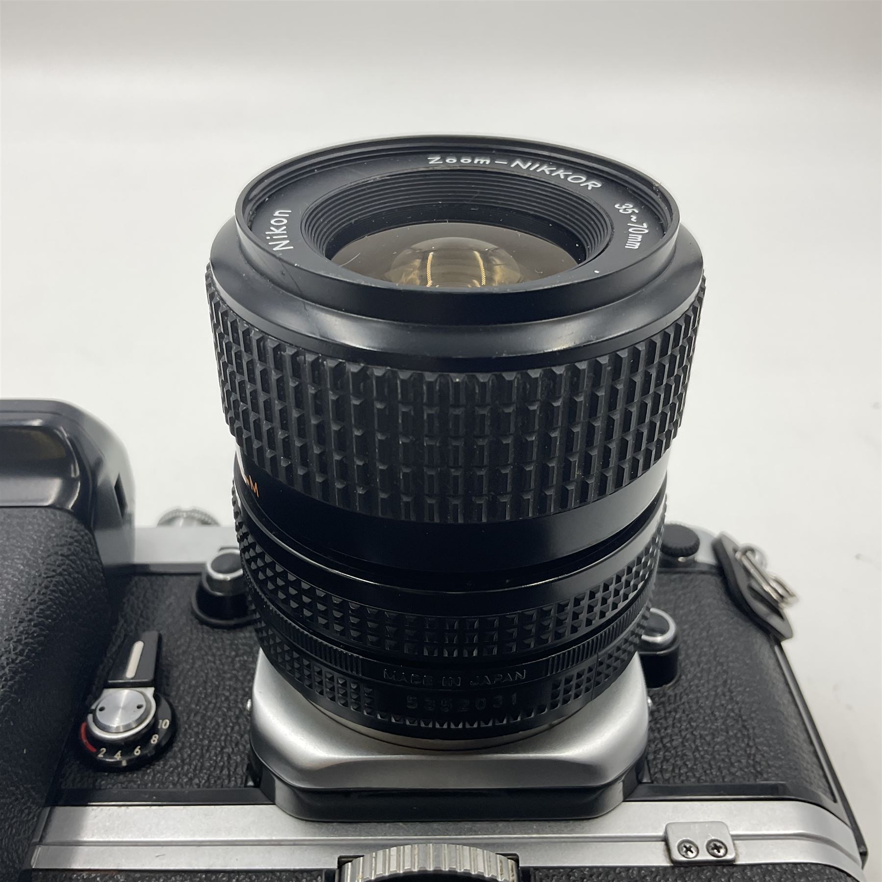 Nikon F2A Photomic camera body, serial no. 7844439, with 'Nikon Zoom-NIKKOR 35-70mm 1:3.5-4.8' lens, serial no. 5352031, Nikon MD1 Motor Drive, serial no. 208608 and Nikon MB1 battery pack