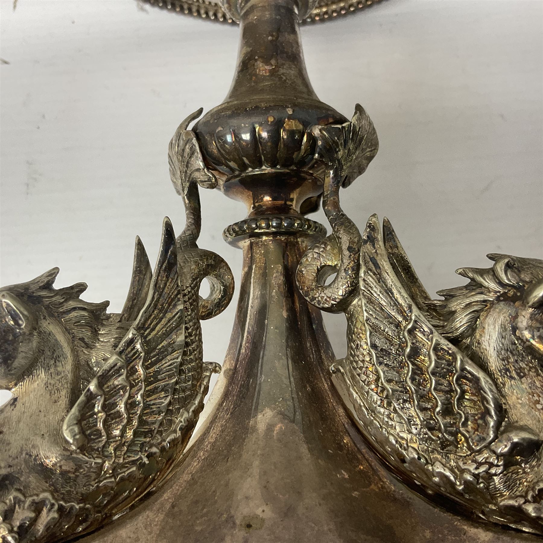 Silver plated centrepiece, with a triform base formed as three Hippocampus with beaded detail, numbered 3682 to the base, H18cm 