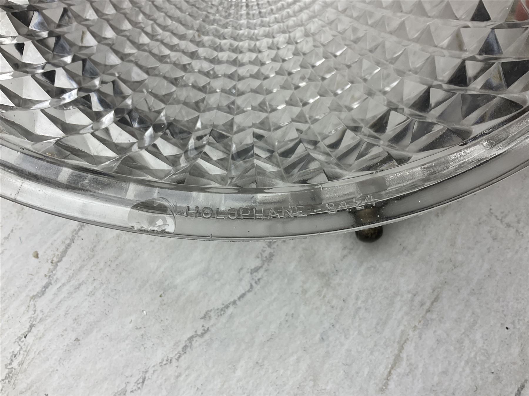 Edwardian glass holophane ceiling light, the domed bowl shade suspended in circular brass frame by three chains, stamped Crystal Bowl Holophane 8424, patent no 1796, 1910 on the inside rim, D35cm