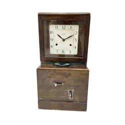Mid-20th century English ATS Time Recording clock c1950 -  twin train spring driven movement in an oak case with original fittings  pendulum and winding key, square painted dial with Arabic numerals and baton hands with key and pendulum, BRYANT stamped on the back of the case. 