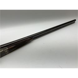 Harrods Ltd. Brompton Road London (Retailer) 12-bore side-by-side boxlock non-ejector sporting gun, 75cm barrels, walnut stock with chequered grip and fore-end and thumb safety, serial no.015, L118.5cm overall SHOTGUN CERTIFICATE REQUIRED