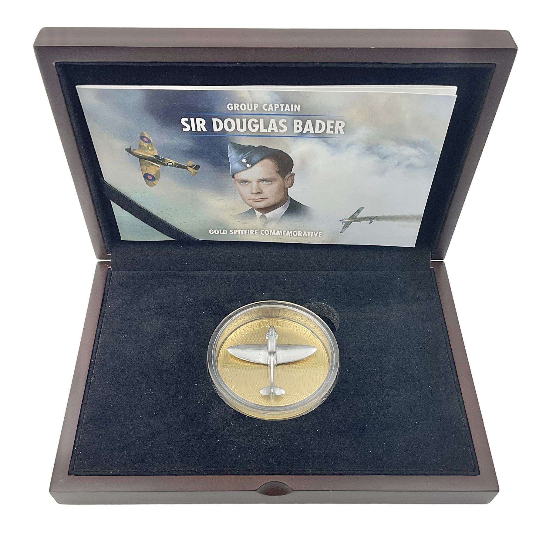 Group Captain Sir Douglas Bader gold spitfire commemorative, 9ct gold medallion mounted with a model of a Spitfire made from aluminium from AB910, gross weight 62 grams, cased with certificate