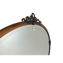 Early 20th century oval wall mirror with ribbon pediment