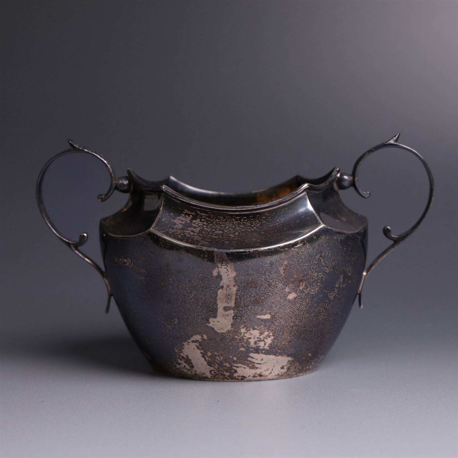 Late Victorian silver twin handled open sucrier, of hexagonal form with acanthus capped handles, hallmarked James Deakin & Sons, Sheffield 1900
