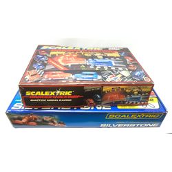 Scalextric - Silverstone Set still in factory sealed transparent packaging and box; and Banger Raceway Set with folding cardboard pit stop, boxed (2)