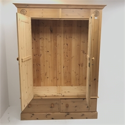 Solid pine double wardrobe, projecting cornice, two doors above two drawers, plinth base, W145cm, H189cm, D56cm