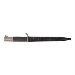 WWII German Third Reich K98 bayonet, with 20cm single edged fullered blade stamped to the ricasso Puma Solingen, with chequered two piece grip in a steel scabbard, overall L35cm