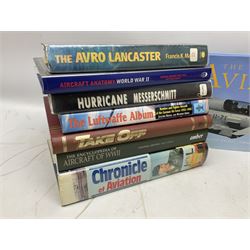 Ten books of predominantly military aircraft interest including Aircraft Anatomy World War Two, Hurricane Messerschmitt, The Avro Lancaster, The Luftwaffe Album, Encyclopaedia of Aircraft of WWII etc; together with a scrap album of WW2 newspaper cuttings