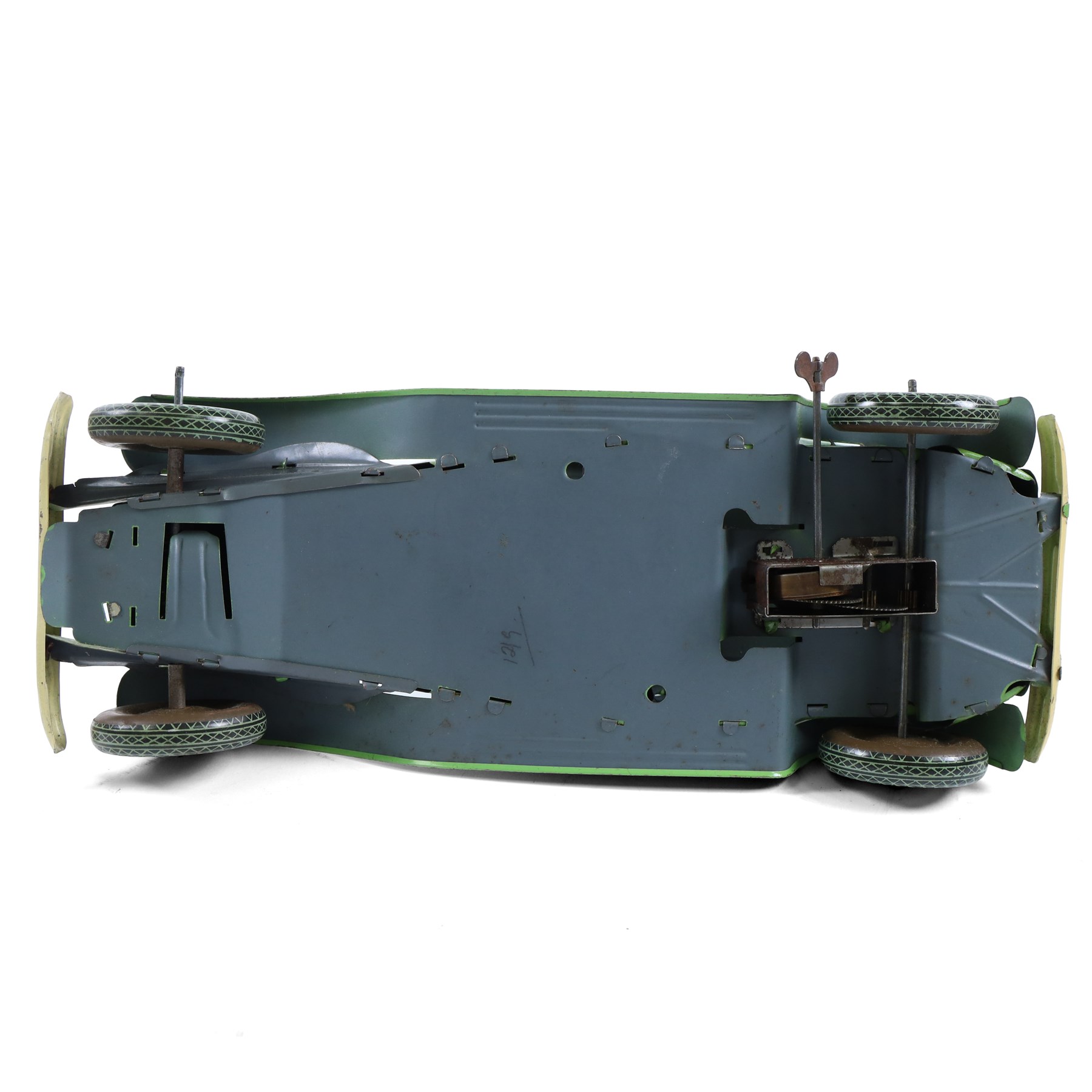 Mettoy large scale tinplate clockwork limousine, circa 1940, with green body and cream lithographed details, red interior with driver, fixed key mechanism, H13cm, L35cm