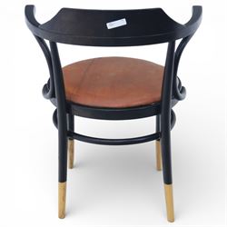 Thonet - 20th century ebonised elbow chair, bentwood construction with a circular brown leather seat, tapering legs with exposed wood supports