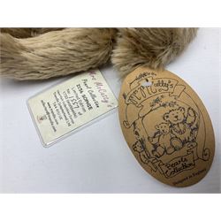 Seven modern Steiff teddy bears comprising two limited edition '1908 Paul the Growler' bears Nos.1124/3000 and 1310/3000; 028649 Classic Teddybear 23; 005992 Classic Teddybear 28 (black); 071249 Mungo Meerkat 30; 079139 Reclining dog for American Kennel Club; and 029561 Petsy gespitzt (1928) 16cm; together with a Mrs. McCatty's limited edition 2156 Sophie bear No.1557/1750; all unboxed but most with labels (8)