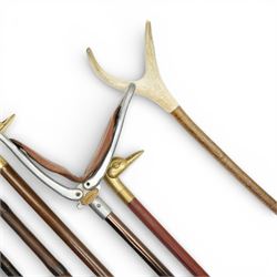Collection of modern walking sticks, ebonised evening canes, thumb stick and shooting stick etc 