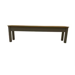 Oak and painted finish rectangular dining table, and two benches