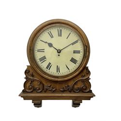 Winterhalter and Hoffmeier -  German oak cased early 20th century fusee wall clock, with a circular wooden surround and a spun brass glazed bezel to the dial, housed on an integral carved bracket with shaped corbel supports, painted dial with Roman numerals, minute track and steel spade hands, dial pinned directly to a four pillar chain driven fusee movement with a recoil anchor escapement. With pendulum and key. 
German fusee movements by Winterhalter and Hoffmeier are comparatively rare, especially housed in carved wall clocks of this description. 