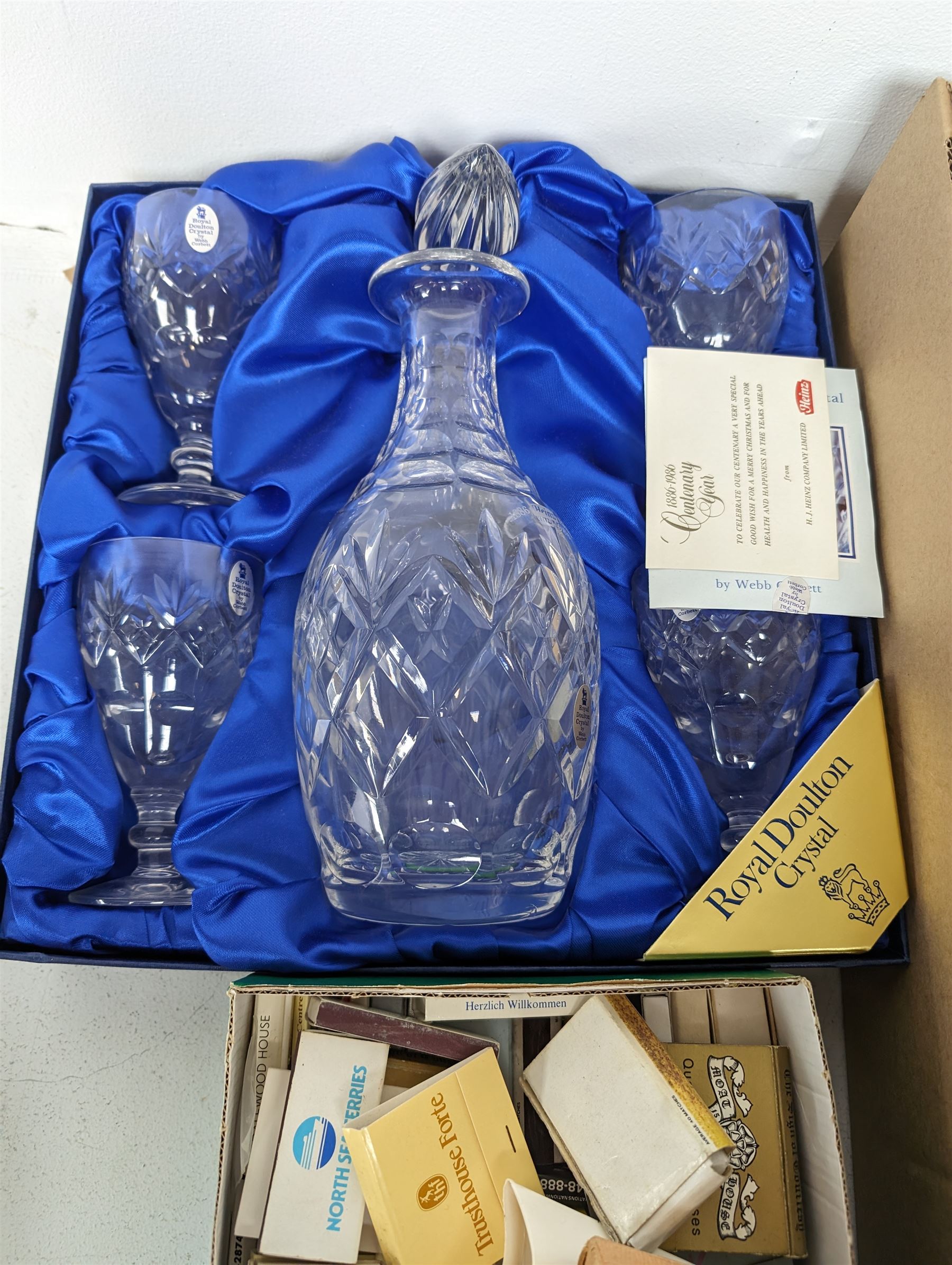 Royal Doulton Heinz Centenary decanter set, boxed, modern games compendium, RMS Queen Mary book and a 1937 Coronation souvenir book, together with matchboxes, cigarette cards, costume cufflinks and other collectables, 