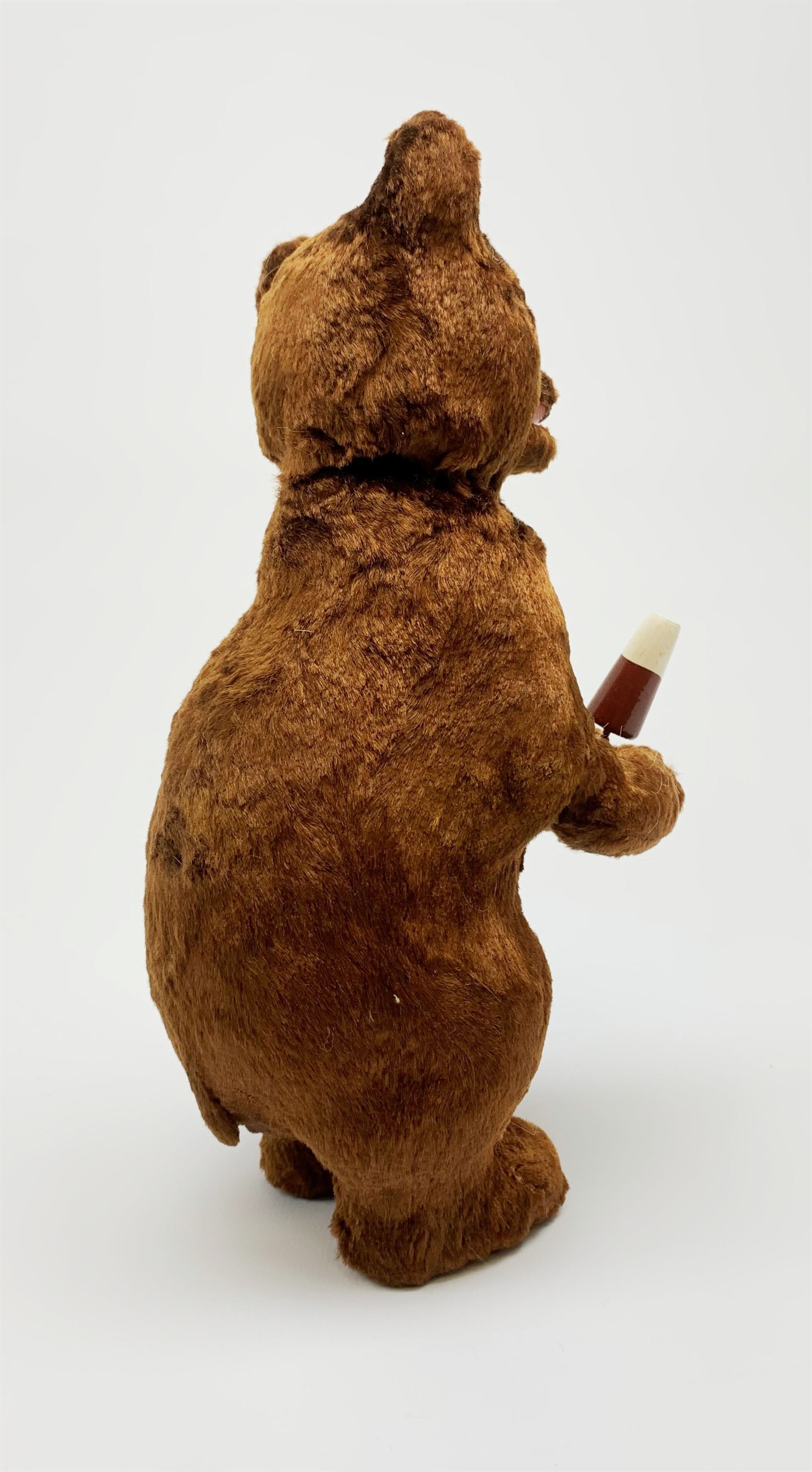 'Meabeab' Russian clockwork plush covered bear c1950s depicted standing with open mouth holding an ice lolly H9