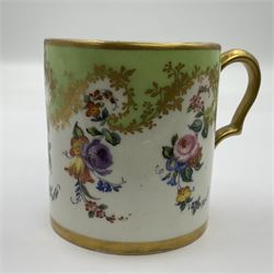 Sèvres soft paste porcelain coffee can and saucer with date code for 1754, painted and gilded with flowers, dangling from the shaped green border, interlaced LL monogram enclosing the date letter A above painters mark for Dodin, coffee can H7cm, saucer D14.5cm
