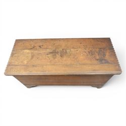 19th century oak boarded blanket box, with chip-carved edges, raised on shaped cut away bracket supports