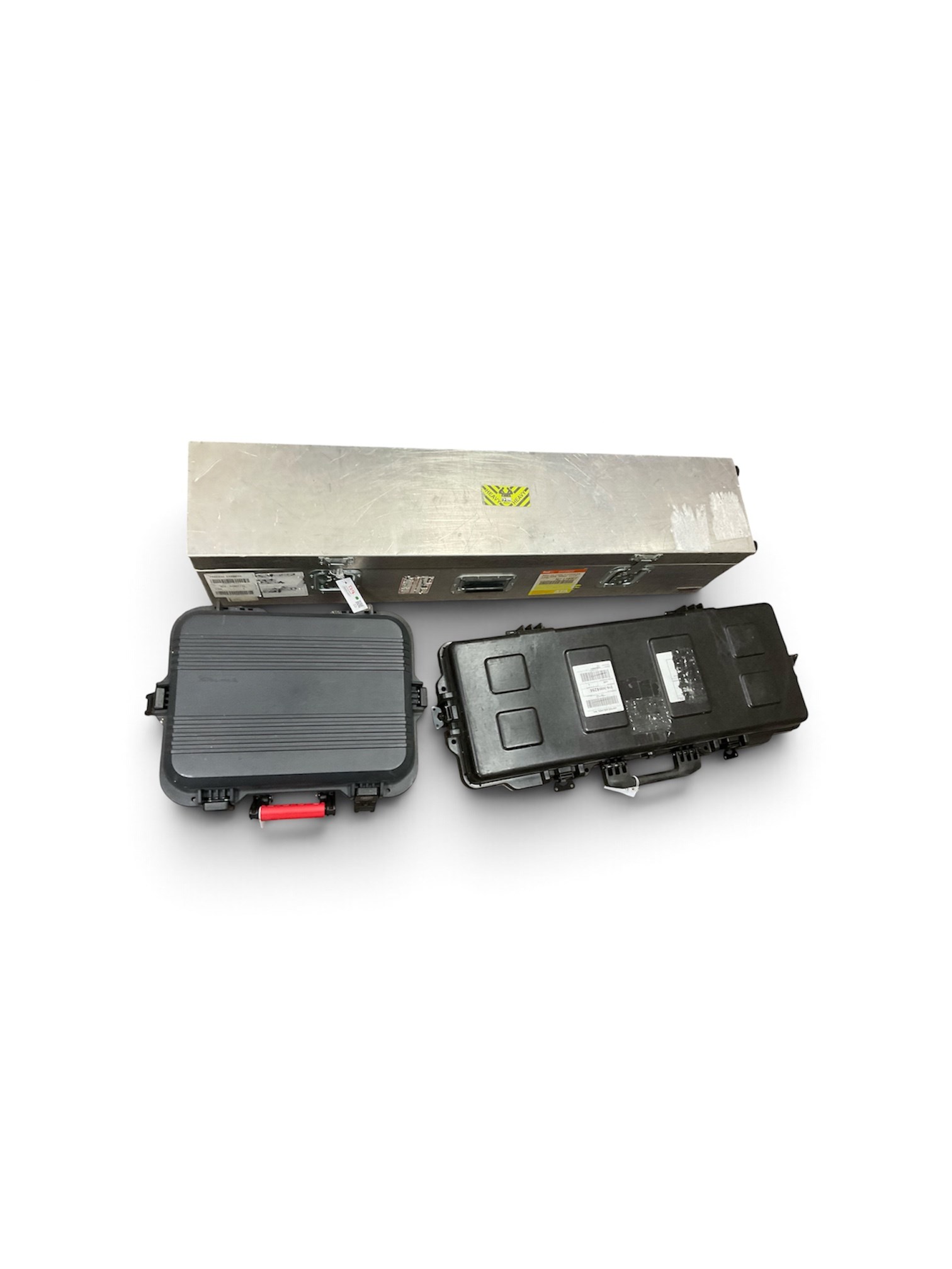 Three hard-shell gun cases, one on wheels, largest L130cm