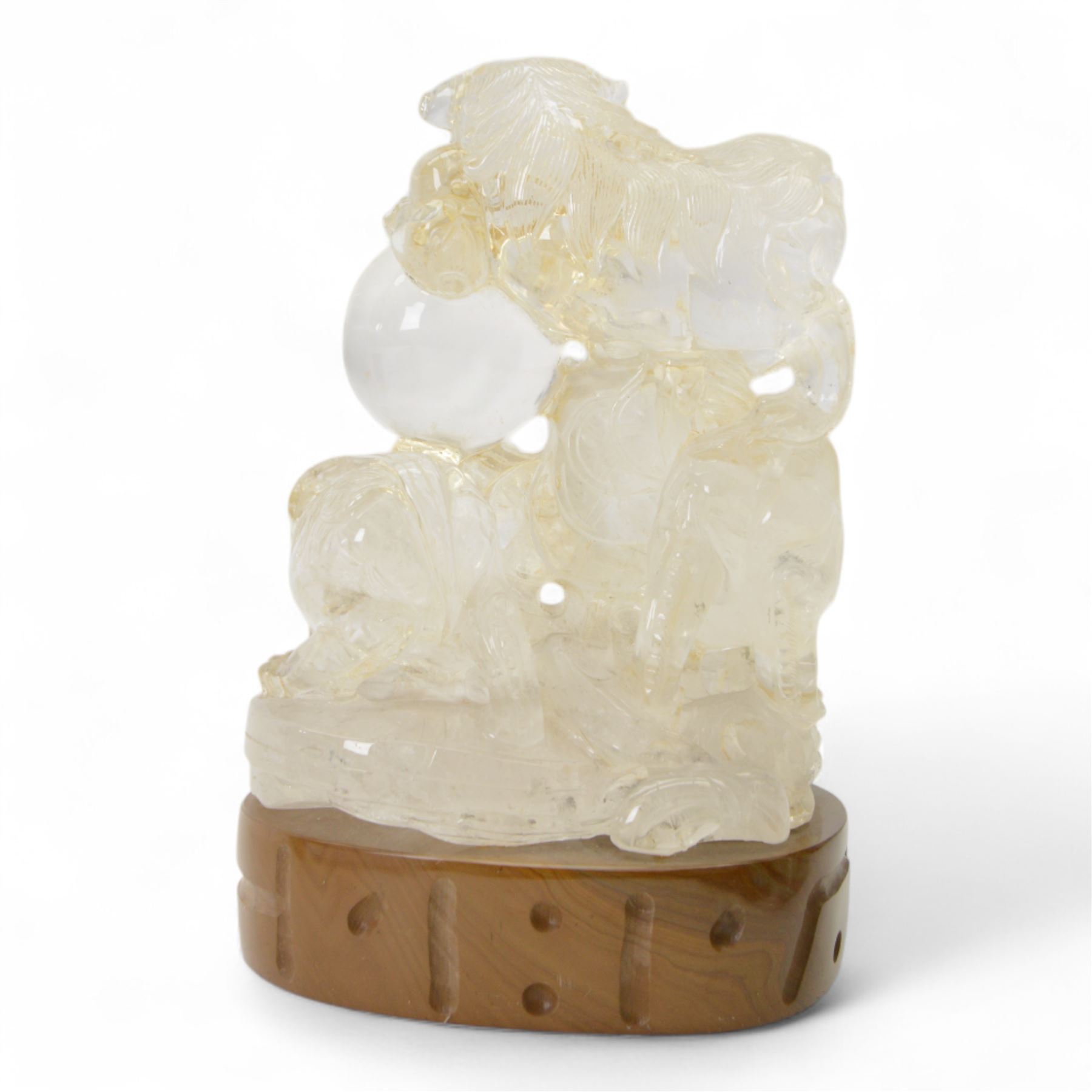 Chinses quartz carved figure group, modelled as three temple lions around a ball, upon an oval base, H20cm