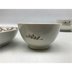 Two 18th century Newhall tea bowls and saucers, the first example decorated with pattern no 195, hand painted painted with floral sprays, the second hand painted with flowers in a gilt boarder, together with a similar tea bowl