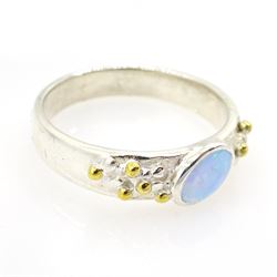 Silver blue oval opal with bead detail shoulders, stamped 925 