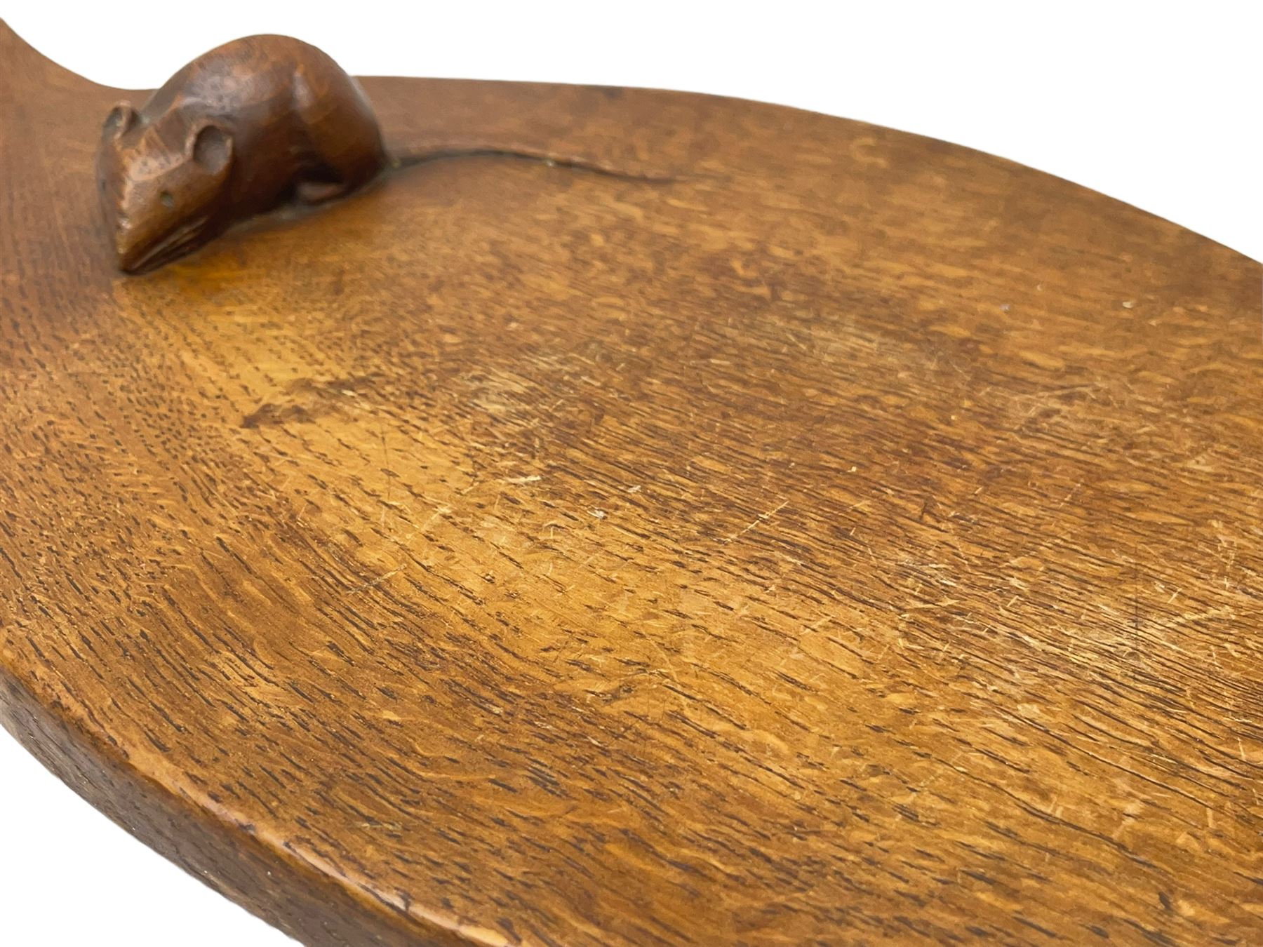 Mouseman - circa. 1940s/50s adzed oak cheese board, oval form with handle, the board carved with mouse signature, by Robert Thompson of Kilburn, L37cm D18cm 