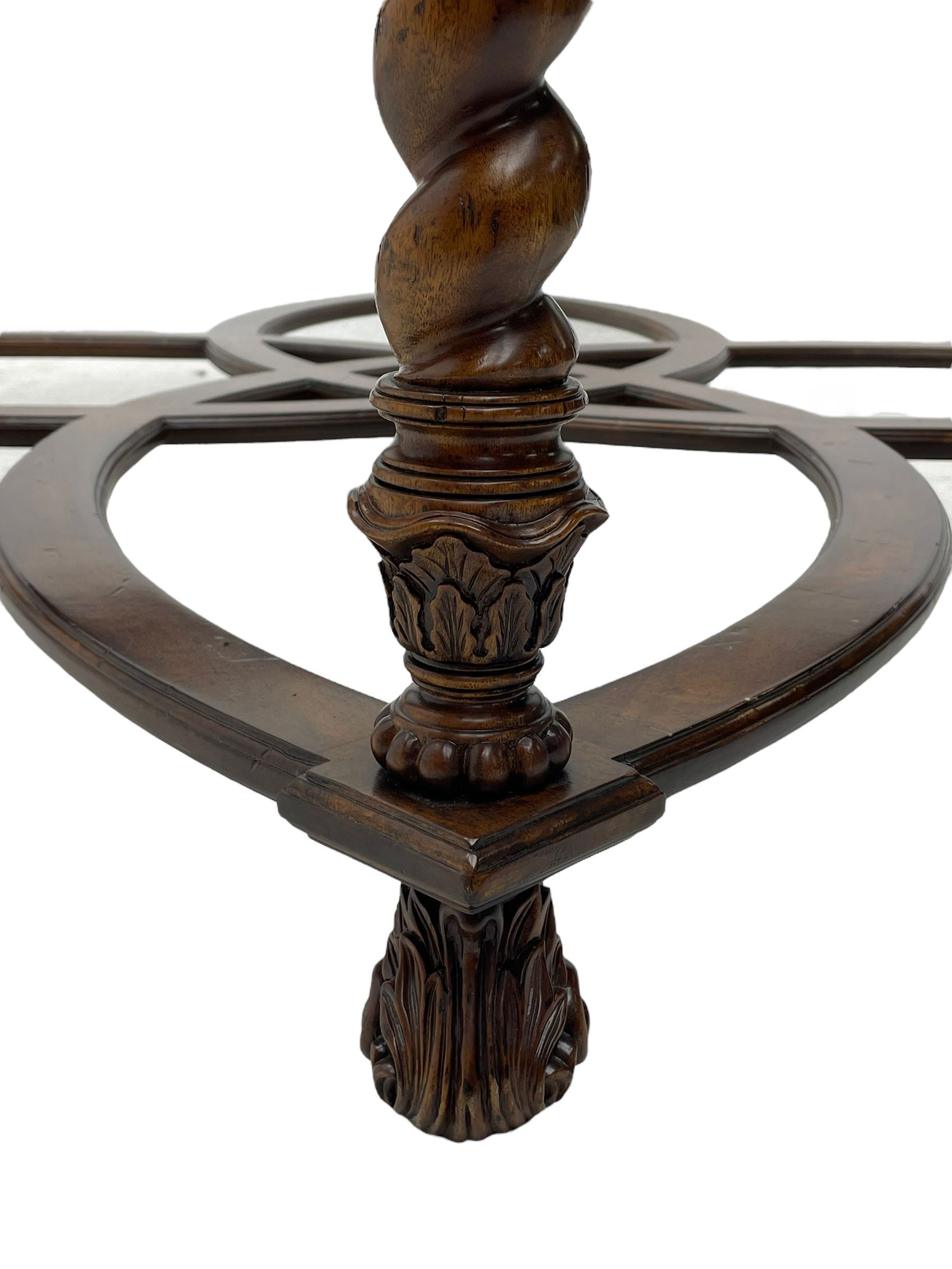 Jonathan Charles - large mahogany coffee table, the square oyster veneered top with verre églomisé inset, the glass hand-painted with gilt scrolling foliate patterns, raised on spiral turned supports with acanthus and gadroon carvings, united by interlocking demi-lune stretchers, on scrolled acanthus feet