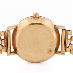 Omega gentleman's 9ct gold automatic wristwatch, gilt dial with baton hour markers and date aperture, back case engraved Tool 106, on a 9ct gold brick link bracelet, London 1976