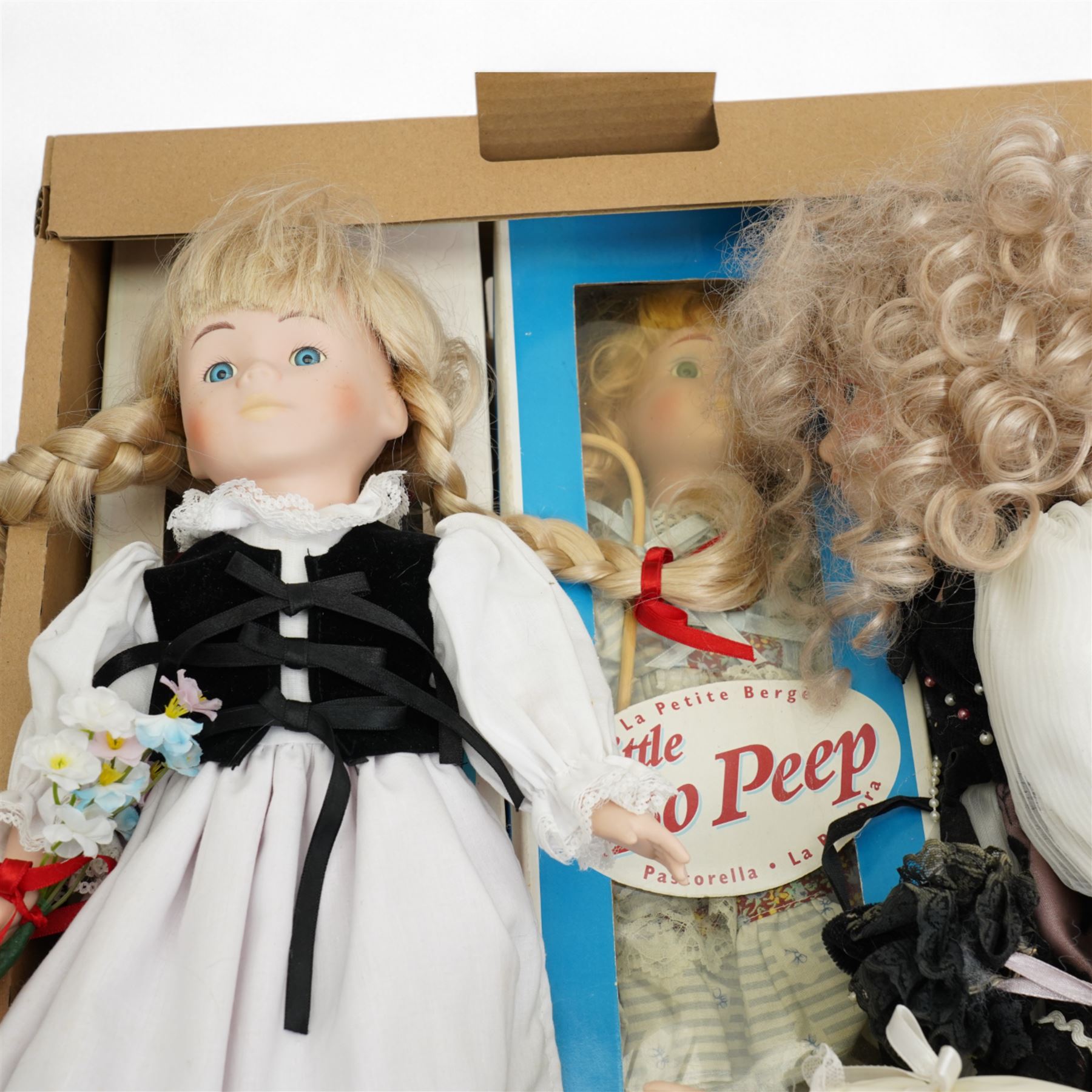 Quantity of modern dressed dolls, few die cast vehicles etc