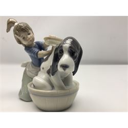 Pair of Lladro figures comprising 'Mis Amigos' model no 5456, and 'Bashful Bather' model no 5455, both with boxes
