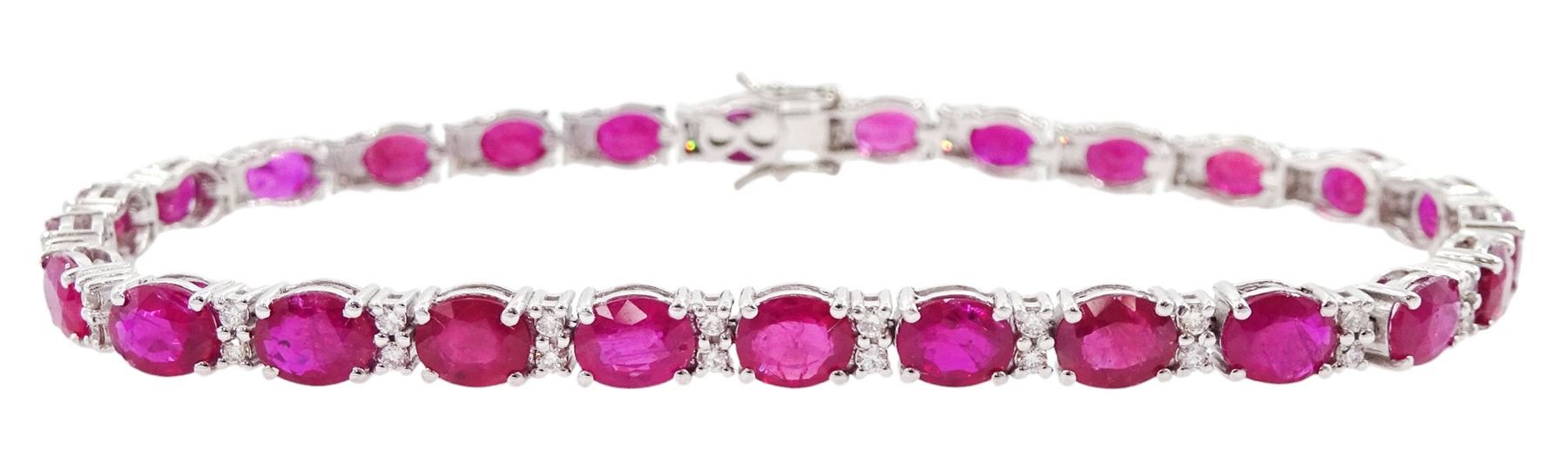 18ct white gold oval cut ruby and round brilliant cut diamond bracelet, total ruby weight approx 9.80 carat, total diamond weight approx 0.50 carat
