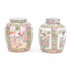 Two Canton famille rose ginger jars and covers, one decorated with birds in blossoming branches, the other with figures in a temple, together with one other jar, H30cm