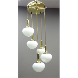  Two matched Darr lighting centre light fittings, the gilt metal fitting having five descending pendant drops with opaque bulbous glass shades and the other having three, H88cm & H67cm   