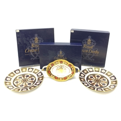 Two limited edition Royal Crown Derby Yorkshire Rose plates, 528/2000, and 584/2000, D22cm, each with maker's box, together with a limited edition Royal Crown Derby Golden Jubilee twin handled dish, 401/500, L22cm, with maker's box. 