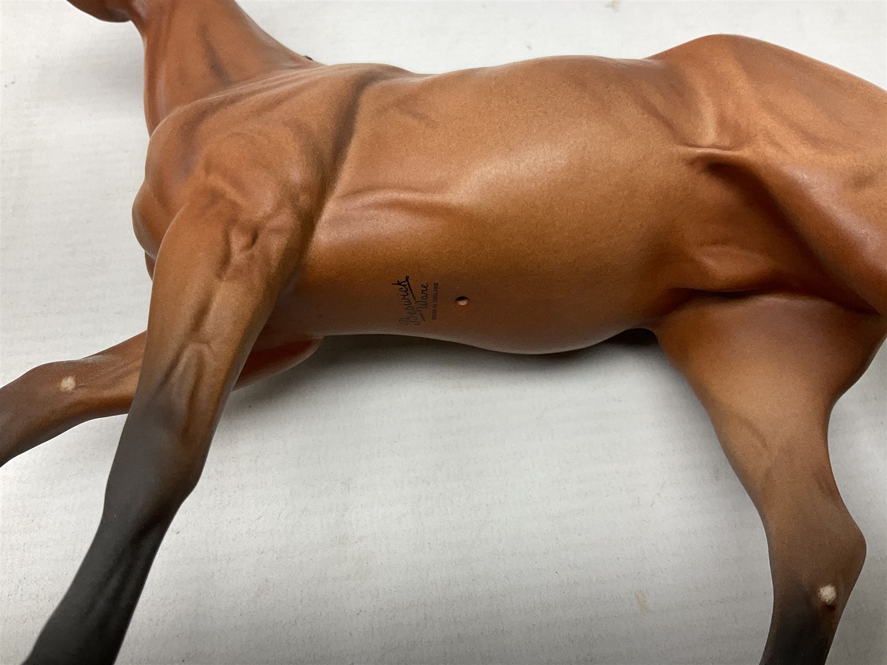 Collection of Beswick horse figures, to include Red Rum on a wooden plinth,  Lammtarra on oval plinth, Morgan Horse Black and three others, together with Royal Daulton Appaloosa Foal and a USSR horse