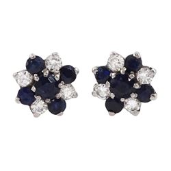 Pair of 18ct gold sapphire and round brilliant cut diamond cluster stud earrings