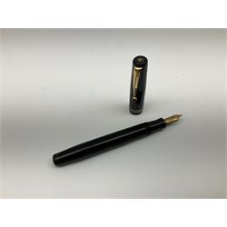 Vintage Swan Mabie Todd lever fill fountain pen in coral red, the nib a/f marked 14K, together with two further vintage Swan Mabie Todd fountain pens, the first example with lever fill, the other leverless, each with black body, one with nib marked 14ct, (3) 