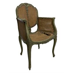 19th century French Louis XV-design armchair, carved and painted wood frame, caned back and seat with scrolled arms, supported by cabriole supports with acanthus leaf decoration