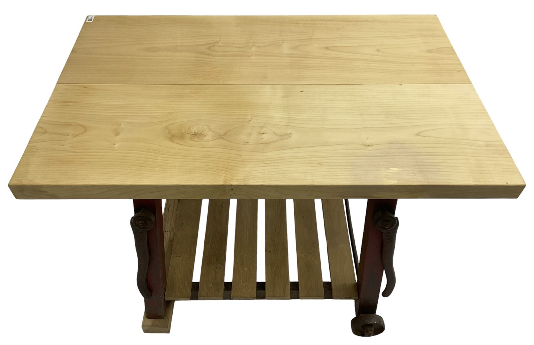 Kitchen island with rectangular maple top, on reclaimed machinery base with oak pot board, on block sledge feet