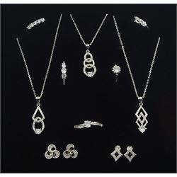 Three silver cubic zirconia pendant necklaces, two pairs of silver stud earrings and five silver cubic zirconia dress rings, all stamped 925 (10)