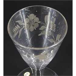 18th century drinking glass of possible Jacobite interest, the funnel bowl engraved with bird in flight and six petal rose, upon a plain stem and conical foot, H11.5cm